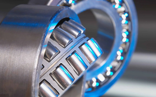 Conas a oibríonn Crossed Roller Bearing faoi choinníollacha uainíochta ardluais?